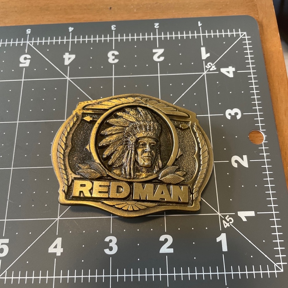 Red Man belt buckle